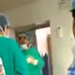Two indian doctors arguing during a c-section operation in which the baby died