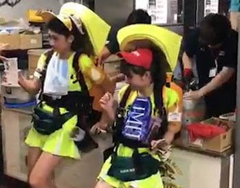 Japanese female beer sellers at a baseball stadium in Tokyo show how to re-fuel with speed