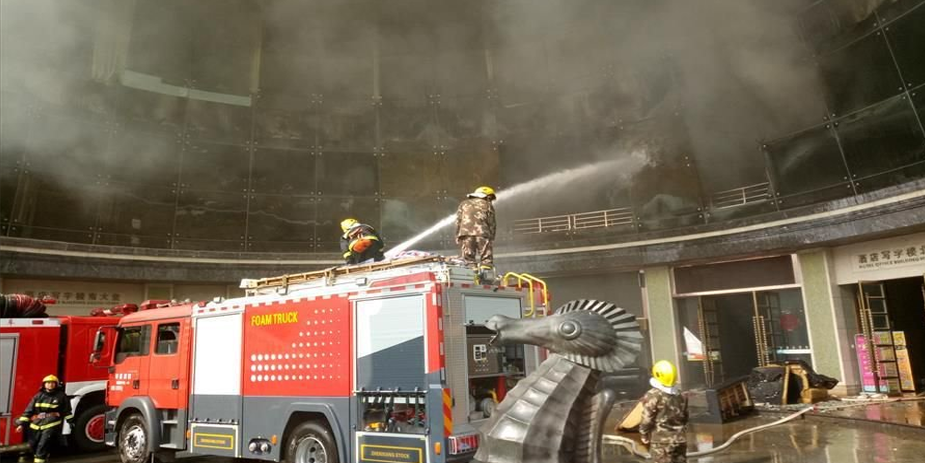 At least 18 dead in China hotel fire