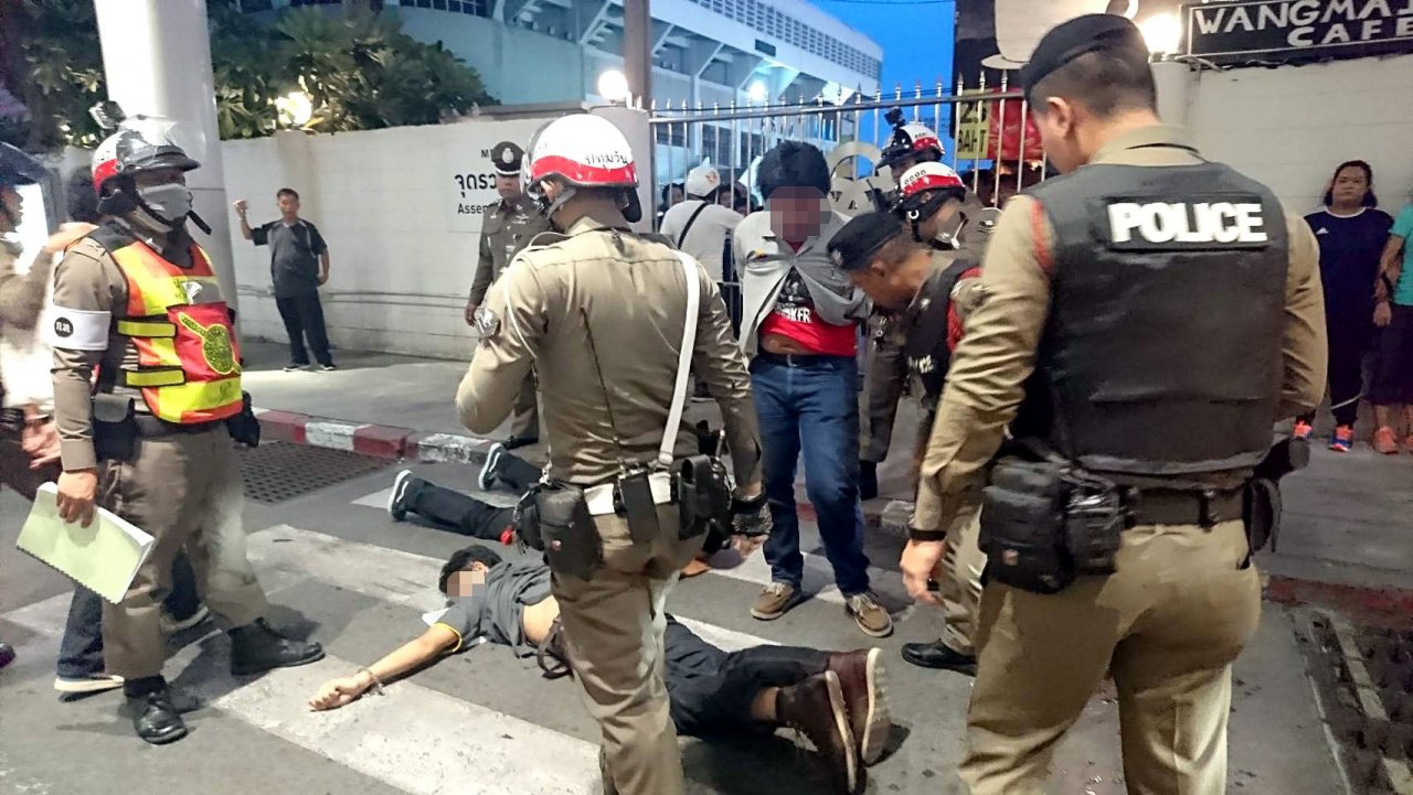 Bangkok police address student brawl