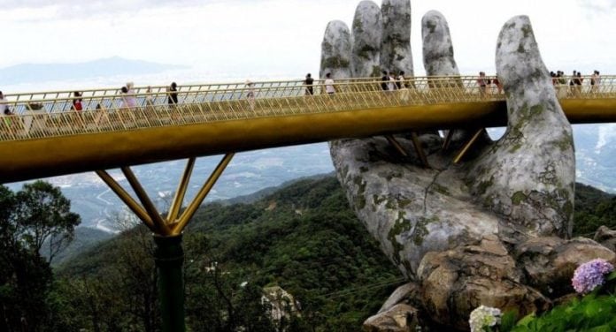 In the hands of the gods: Vietnam’s Golden Bridge goes viral. Nestled in the forested hills of central Vietnam two giant concrete hands