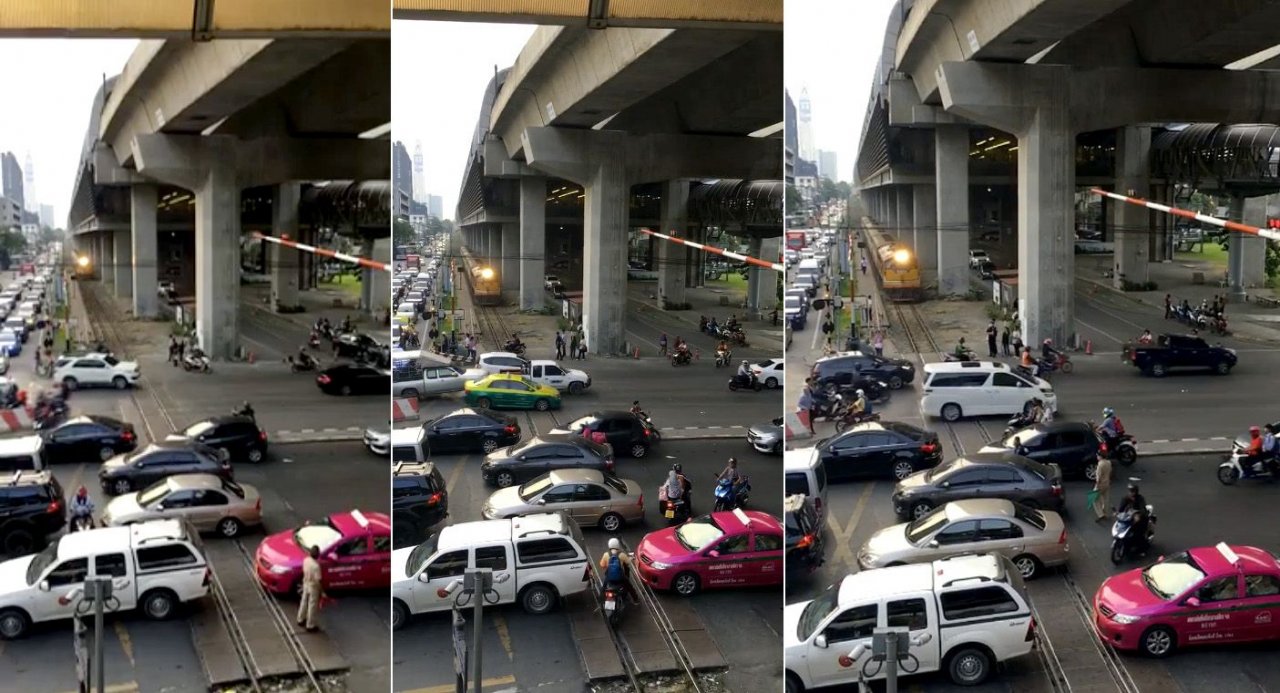 Clip of train caught in notorious Bangkok traffic goes viral