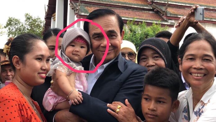 PRAYUTH SAYS HE’S EVERYONE’S DAD. THAINET VOMITS IN MOUTH.