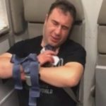 Aggressive doctor restrained on flight from Bangkok