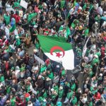 Algerians abroad return home, seeing hope in protest movement