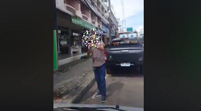 Foreigner places no parking sign on public road in Pattaya