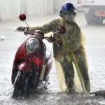 Heavy rain brings Bangkok to a standstill