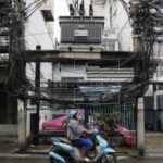 Scooter rider strangled by ‘HANGING WIRES’ in Bangkok