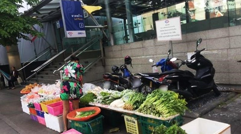 Street Seller in front of MRT won’t let girl get her motorbike