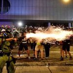 Tear gas and rubber bullets fired as Hong Kong returns to chaos