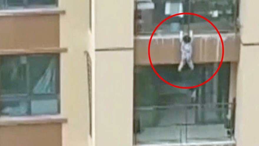 Child falls SIX FLOORS and is caught in a blanket