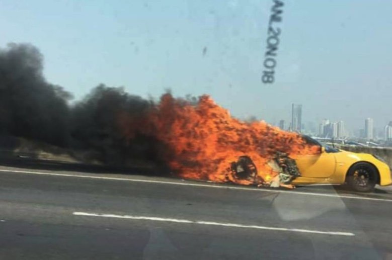 Supercar "worth millions" engulfed in flames on expressway near Bangkok