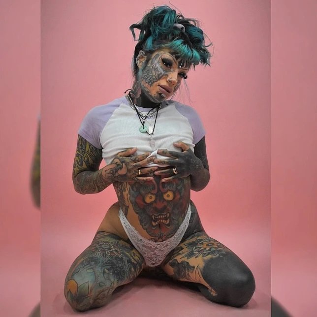 Woman with 85% of body covered in tattoos accused of satanism