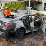 Lucky Swedish man helped out of burning car