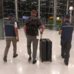 arrested at airport for alleged investment fraud