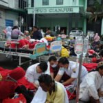 Medical workers treat victims outside the district hospital after an earthquake hit Cianjur, West Java province, Indonesia on Monday. (Antara Foto/Raisan Al Farisi via REUTERS)