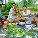 Thais sharing food