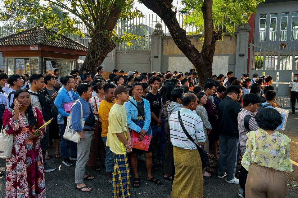Two killed in crush as hundreds queue for passports