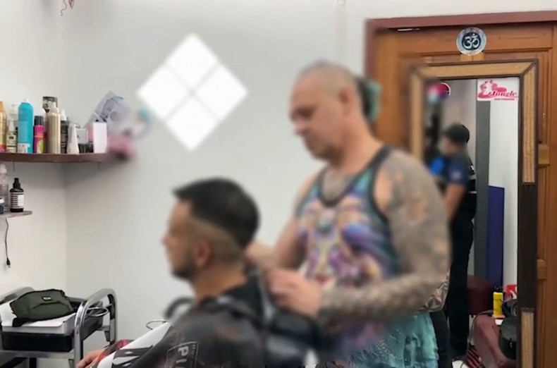 Swiss barber held for working