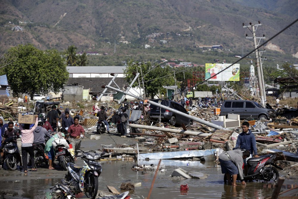 Mass Burials As Death Toll In Indonesia Quake Tsunami Tops 800