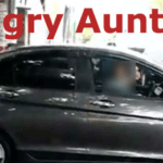 Angry auntie parked her car in the middle of the road to take a nap.