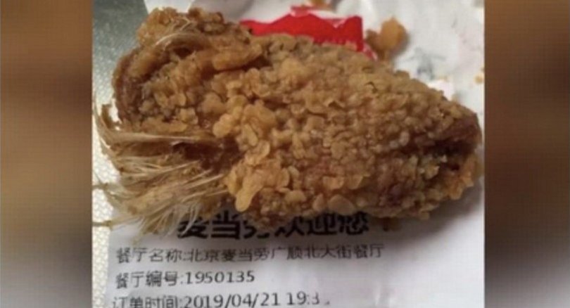 Chinese girl has nightmares after eating McDonald’s chicken wings with feathers still on