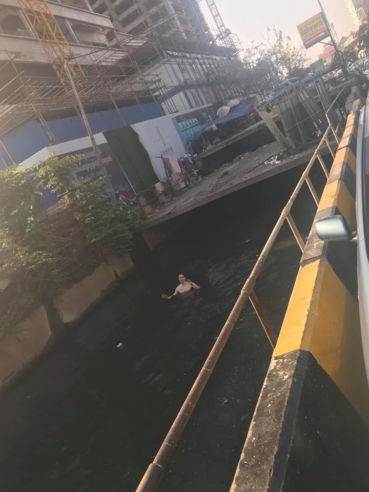 Crazy Tourist Swims in Cambodia Canal