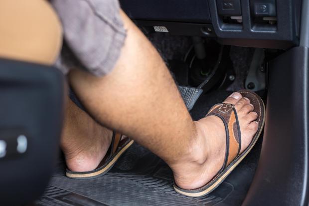 FLIPPING OUT How driving in flip flops could land you a £5,000 fine, NINE penalty points and a road ban