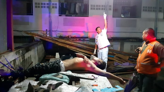 Mystery man falls through Pattaya car park roof