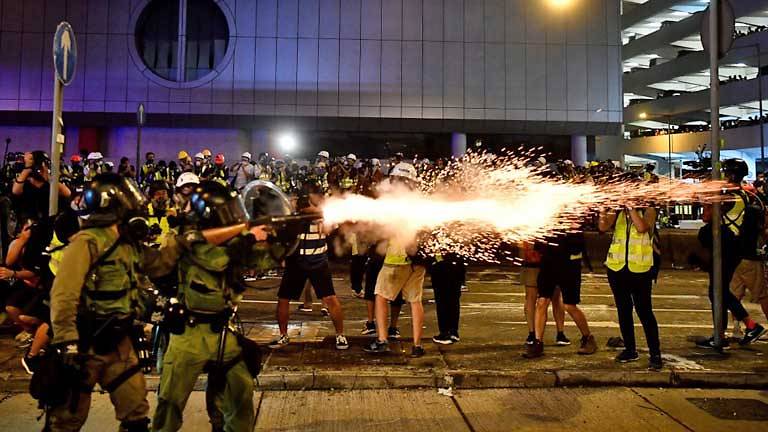 Tear gas and rubber bullets fired as Hong Kong returns to chaos