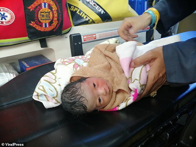 Baby rescued after being thrown out with the trash in Bangkok