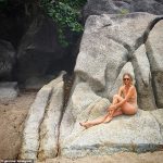 Model Gemma Ward appears to pose completely naked on a rock while holidaying in Thailand