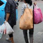 Stores try to cut down on plastic bags, but shoppers remain stubborn