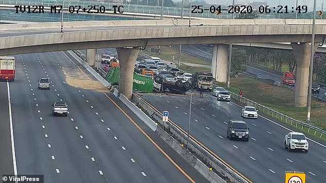 Lorry topples