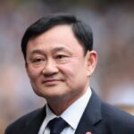 Thaksin claims major pork merchants