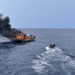 Fishing boat burns, sinks after being caught