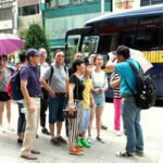 chinese tourists on busses