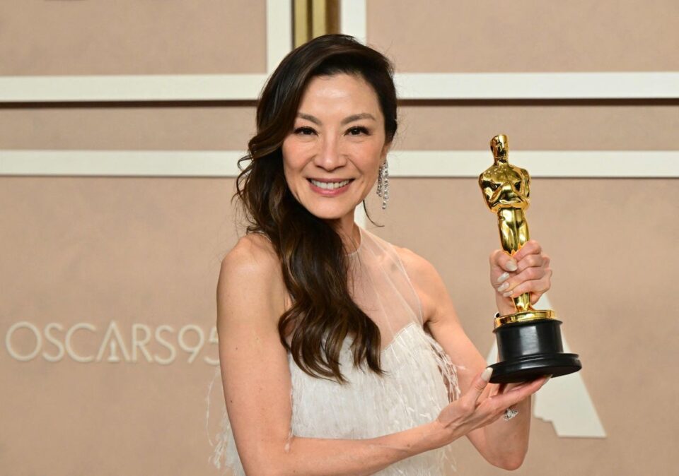 Malaysian actress Michelle Yeoh poses with the Oscar for Best Actress in a Leading Role for "Everything Everywhere All at Once" in the press room during the 95th Annual Academy Awards