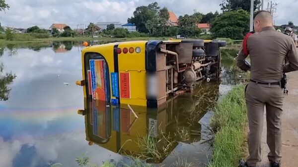 School bus crashes into paddy field