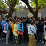 Two killed in crush as hundreds queue for passports