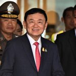 Thaksin to face trial for royal insult